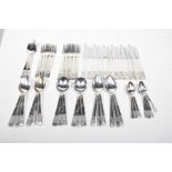 A collection of community flat ware To include twelve dinner knives and forks, two dessert spoons,