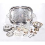 A mixed collection of EPNS To include a pressed glass claret jug, rose bowl, various lidded dishes,