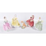 A collection of Royal Doulton figures To include "Ballad Seller", HN2266, "Ninette", HN2379,