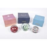 A small group of Scottish glass paperweights To include a Strathearn Millefiori example,