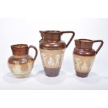 A small group of 19th century Doulton Lambeth stoneware jugs To include a graduated pair,