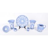 A collection of Wedgwood Jasperware To include a plate, a pair of vases, jug, dish and various pots,