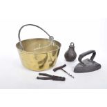 A mixed collection of metalwares To include a brass jam pan with swing handle,