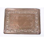 A late 19th early 20th Century rectangular Art Nouveau copper tray Having a galleried rim enclosing