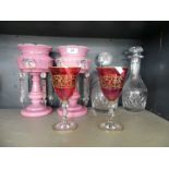 A pair of late 19th Century pink glass lustres with clear glass drapes,