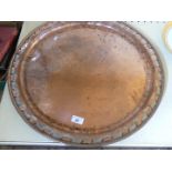 A large Hugh Wallace late 19th/early 20th Century hammered copper tray with silvered checkered rim.