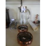 A silver-plated eight bar toast rack, together with a pair of copper bottle holders,