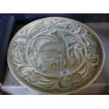 An Art Deco Burleighware circular wall charger with relief decoration.