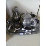 A retro planished pewter tea service on tray.