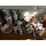 A quantity of modern Oriental ceramics to include a range of various vases, eggshell tea wares,