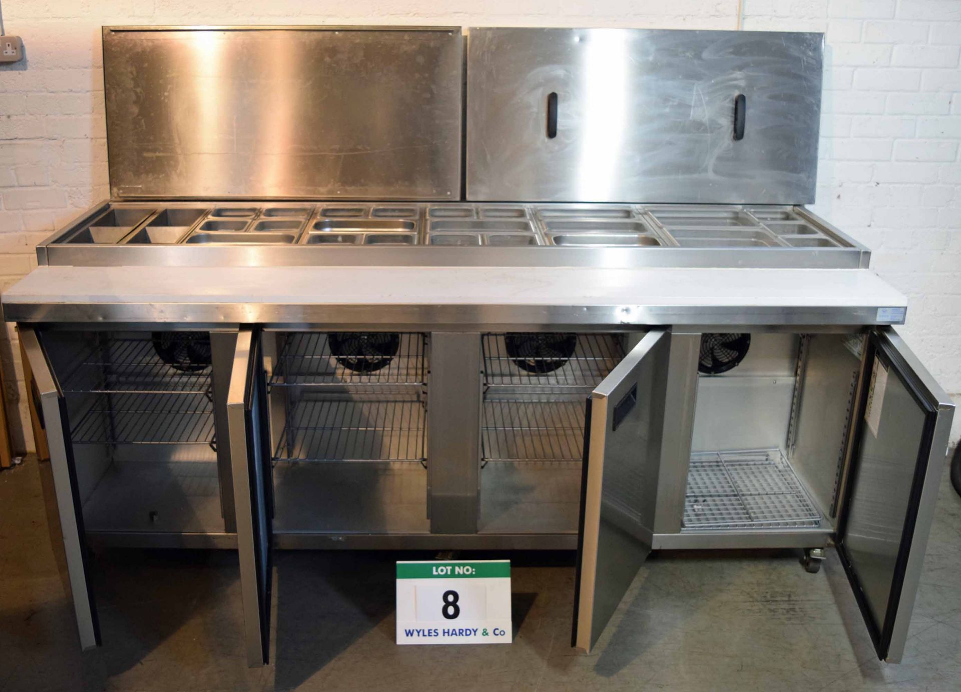 A FOSTER FPS4HR 3M Stainless Steel Saladette & Preparation Counter with 4-Door Chilled Cupboard