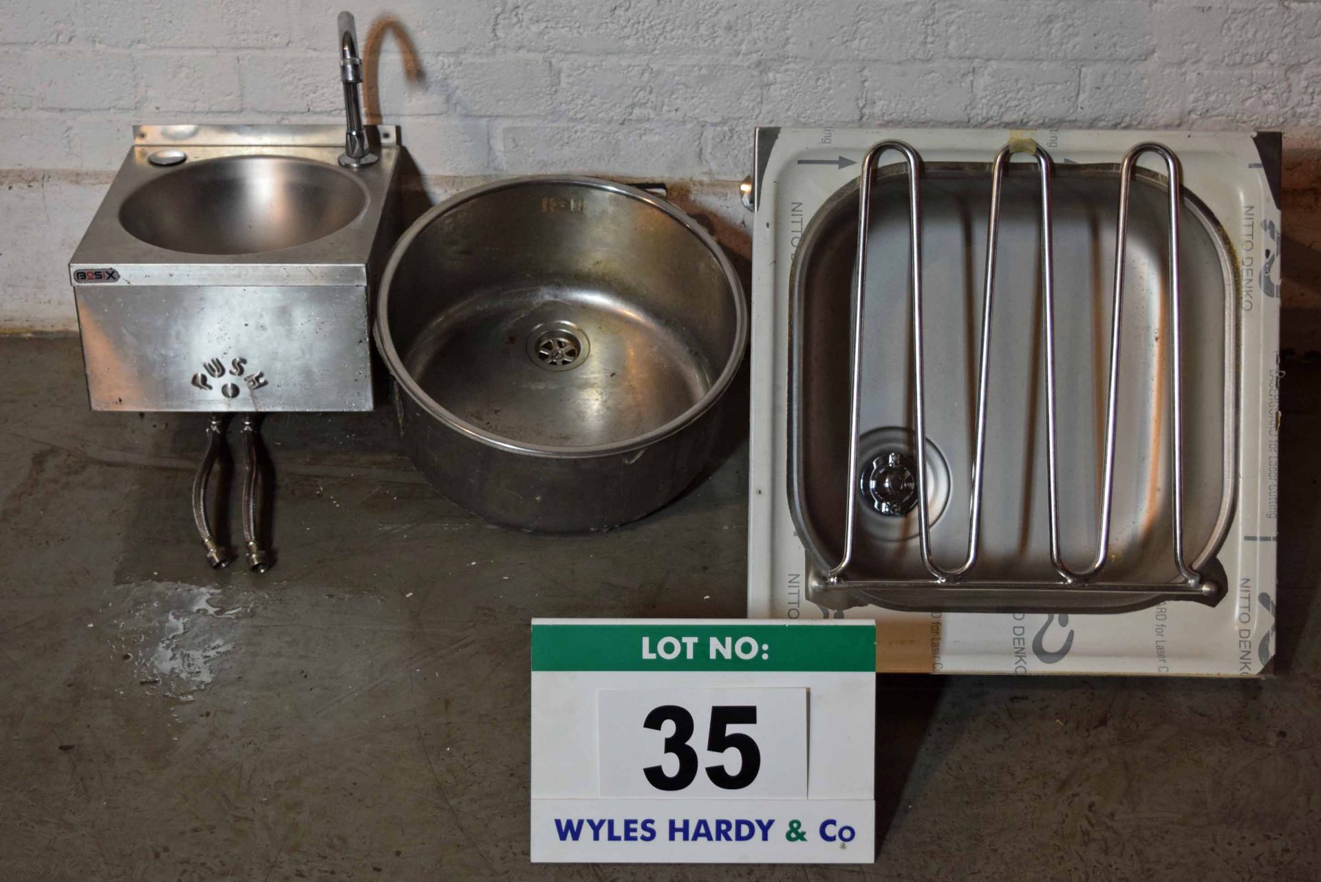 A Stainless Steel Hand Basin with Knee Push Actuation, A Flush Mount Roud Bowl & A Sluice Sink (As