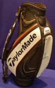 A TAYLORMADE TM16 Tour Cart Golf Bag in Black/White/Red/Gold featuring 6-Way Velour Top (8.5 inch