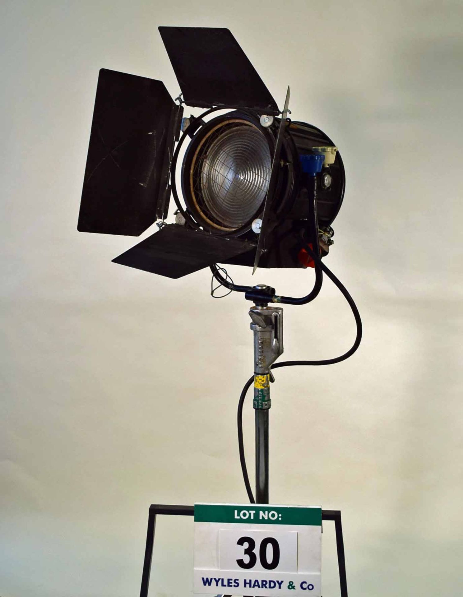 A Castor 273 2000 Watt Pole Operated FRESNEL Light with Barn Doors Mounting Bracket and Spigot