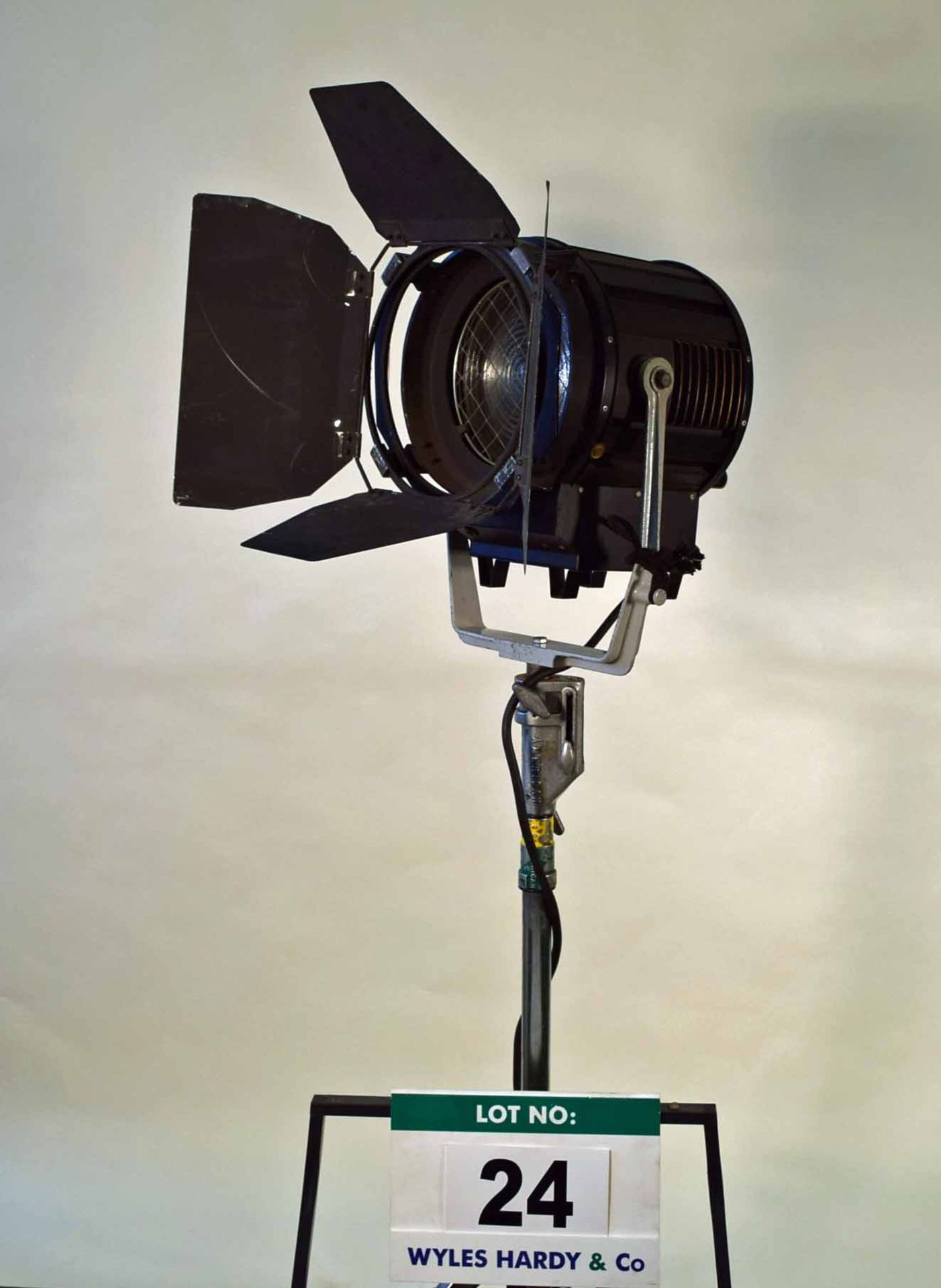 An LTM LT 2000 Watt FRESNEL Light with Barn Doors Mounting Bracket and Spigot