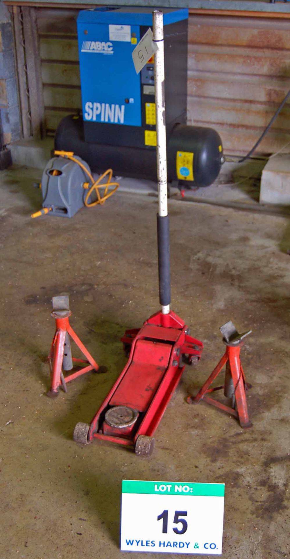 A SEALEY 3075LE Low Level Entry 3-Tonne Trolley Jack and a Pair of Steel Axle Stands
