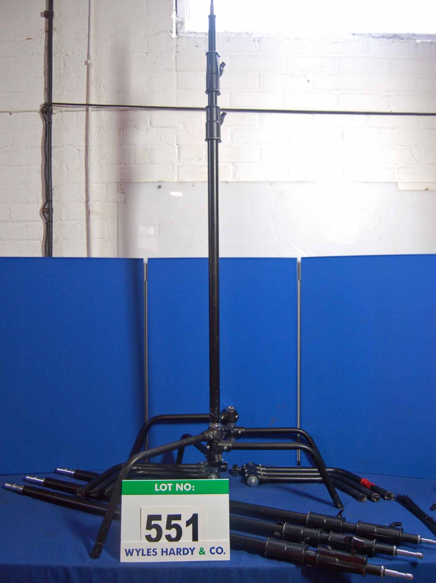 Four Heavy Duty Extending Lighting Stands (Note - One with Foot Missing)