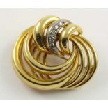 BROSCHE, 750/ooo Gelbgold, besetzt mit kleinen Diamanten, Dm 3,2, 11,2g 22.00 % buyer's premium on