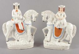 PAAR REITERFIGUREN, Keramik, polychrome Craqueleéglasur, H 29, ungemarkt, min.besch., 20.Jh. 22.00 %