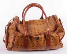 TASCHE MCM, Leder, Länge ca. 53 cm 22.00 % buyer's premium on the hammer price 19.00 % VAT on