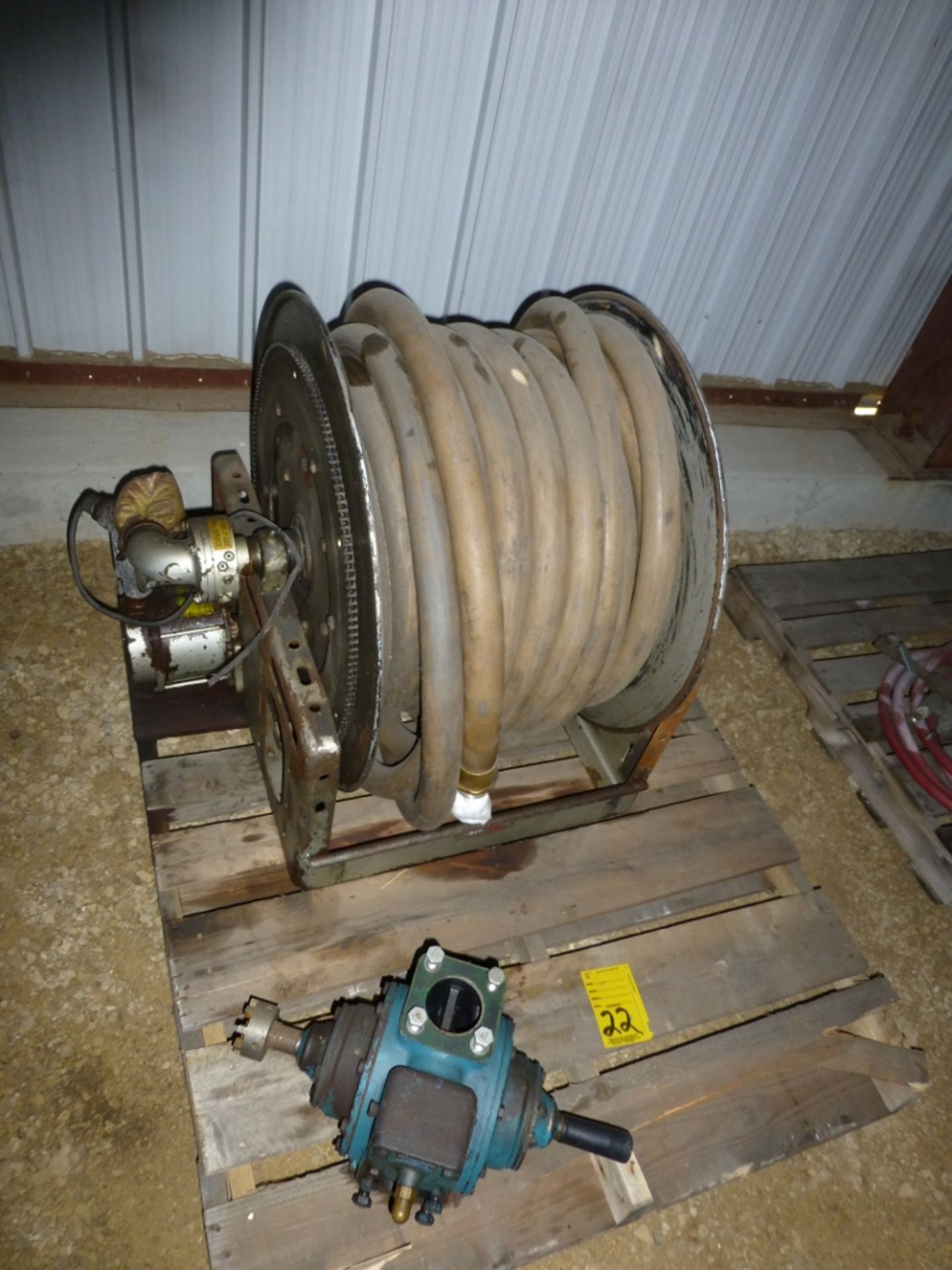 Hydraulic hose, reel, and pump.