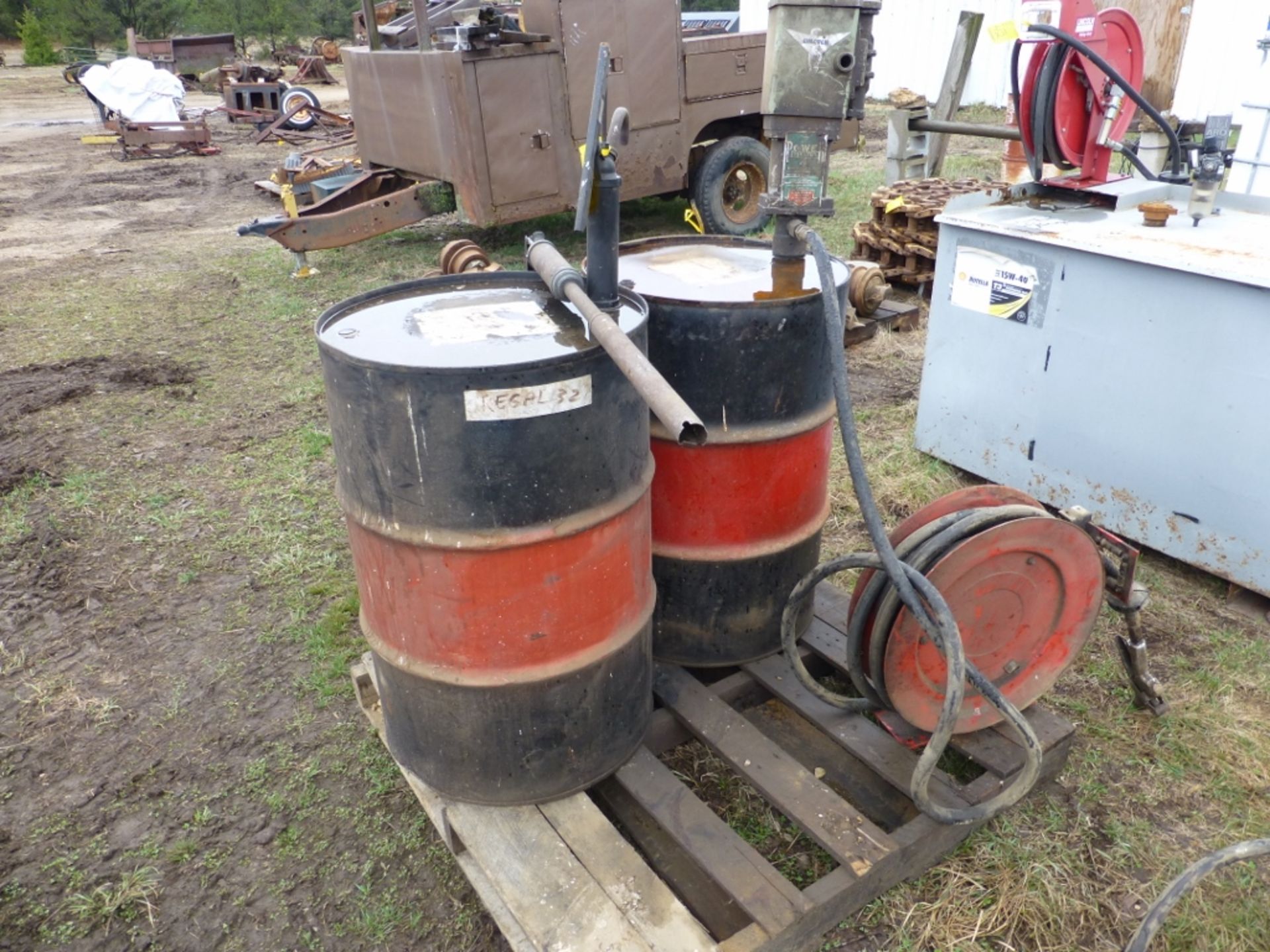 2 fuel barrels- w/ pump, hose, and reel - Image 3 of 4