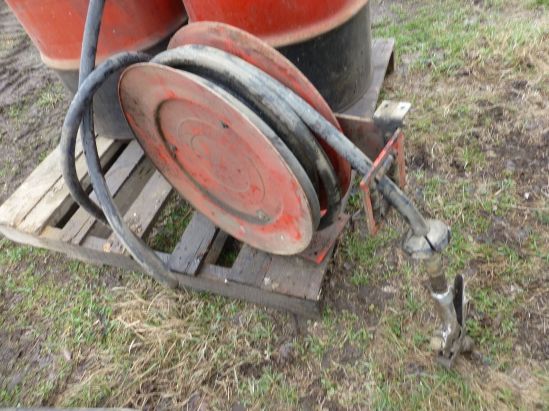 2 fuel barrels- w/ pump, hose, and reel - Image 4 of 4