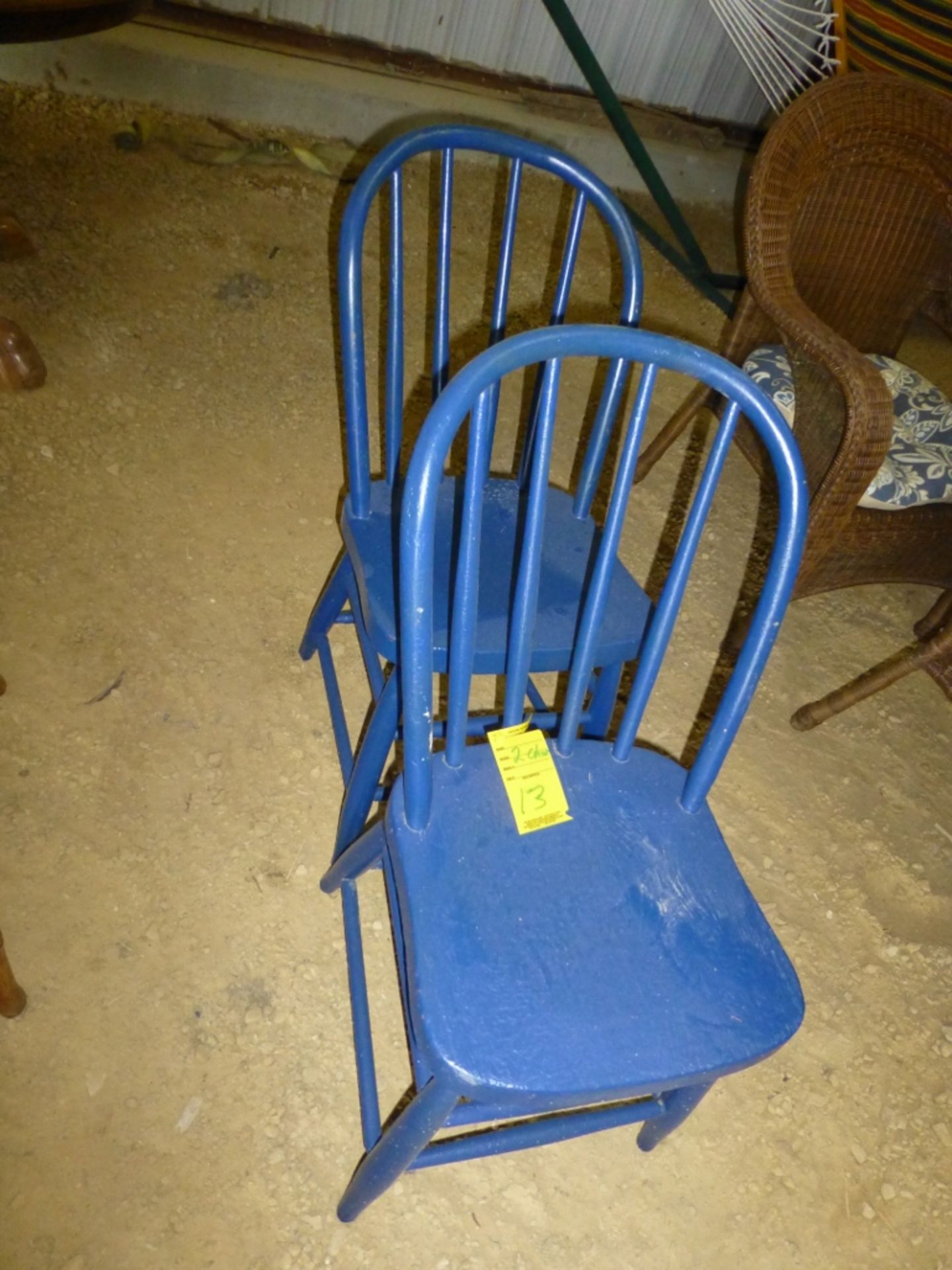 2 blue wood chairs