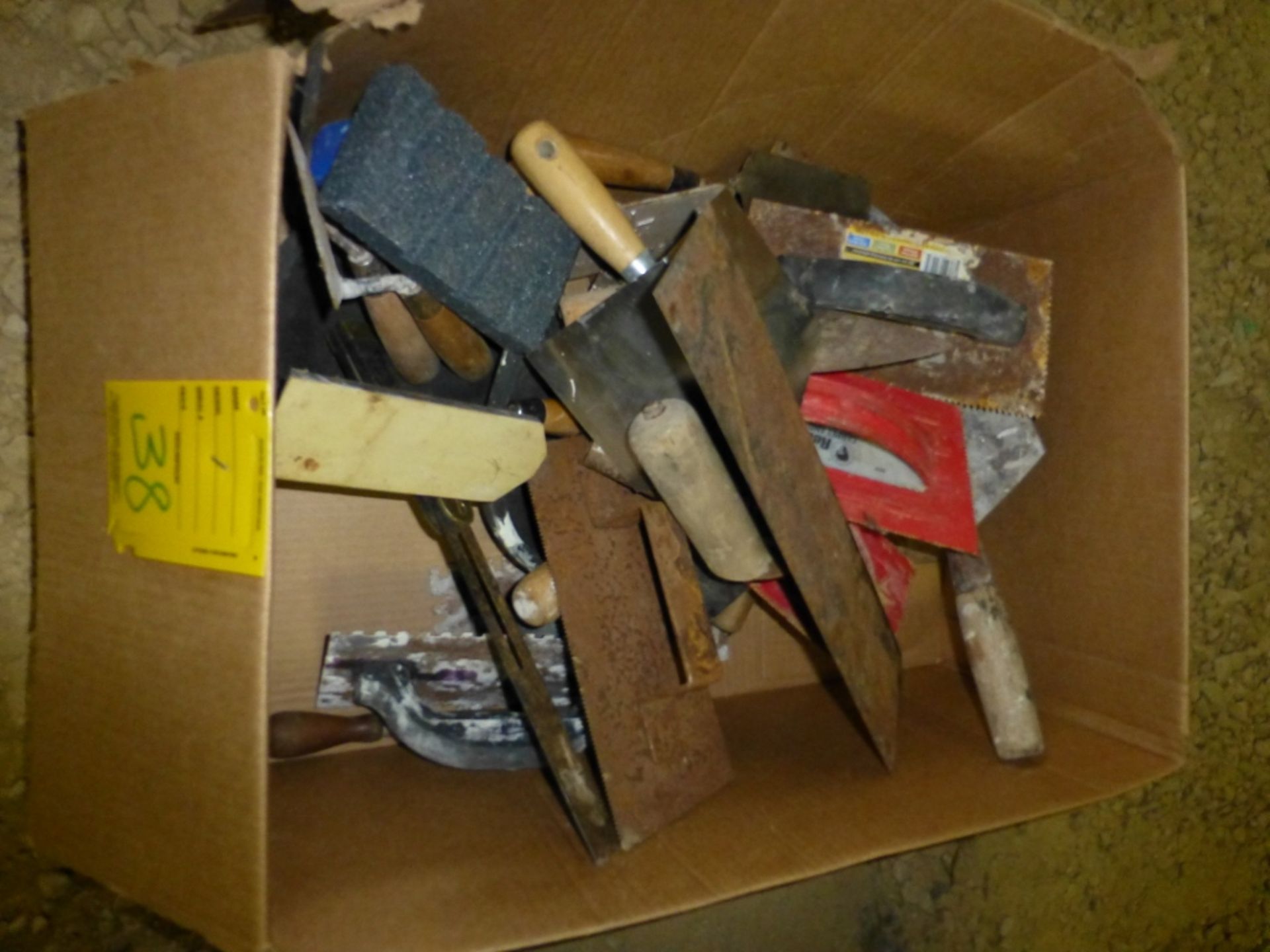 Box with assortment of trowels