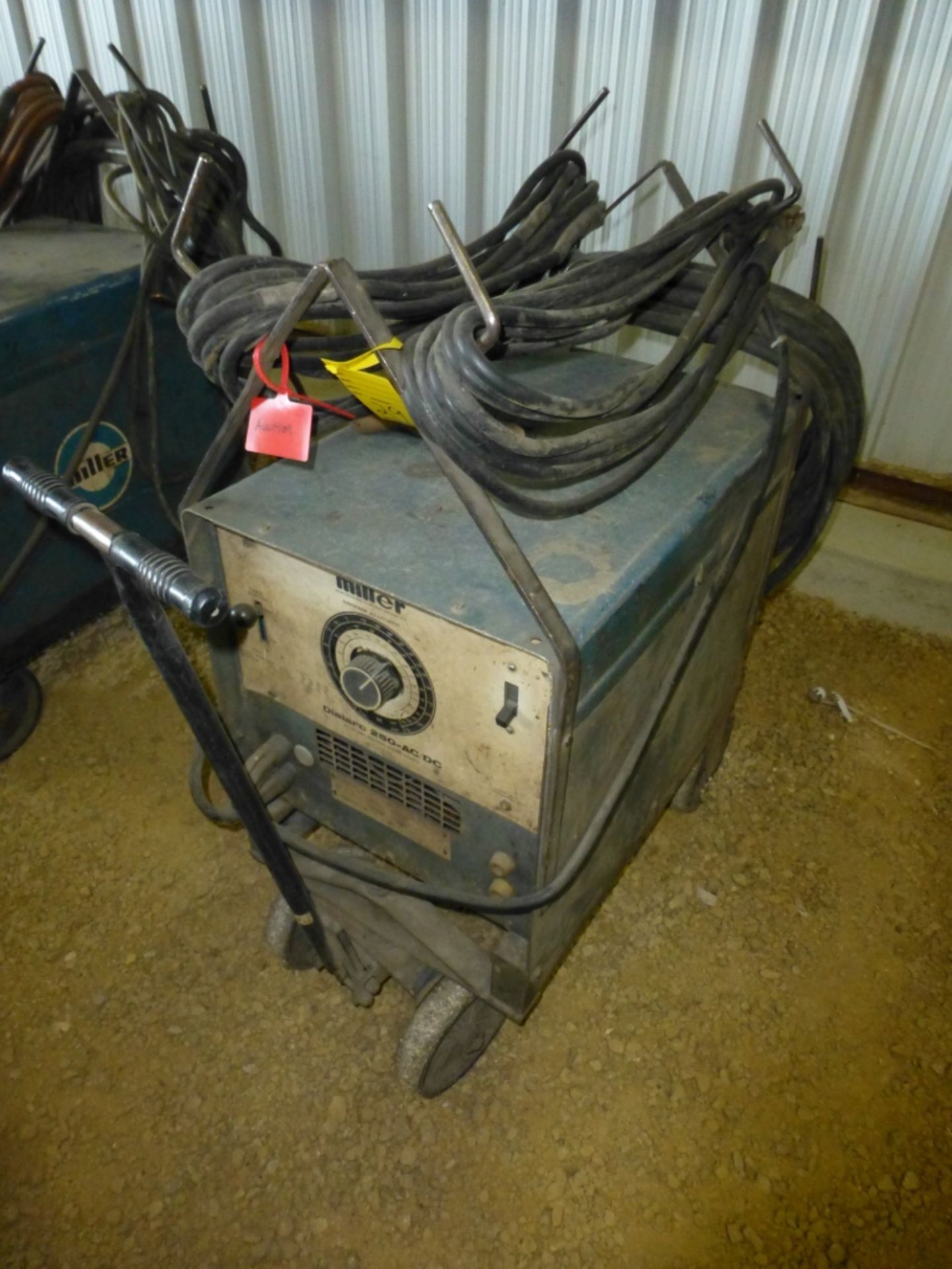 Miller 250 AC/DC arc welder, unknown condition.