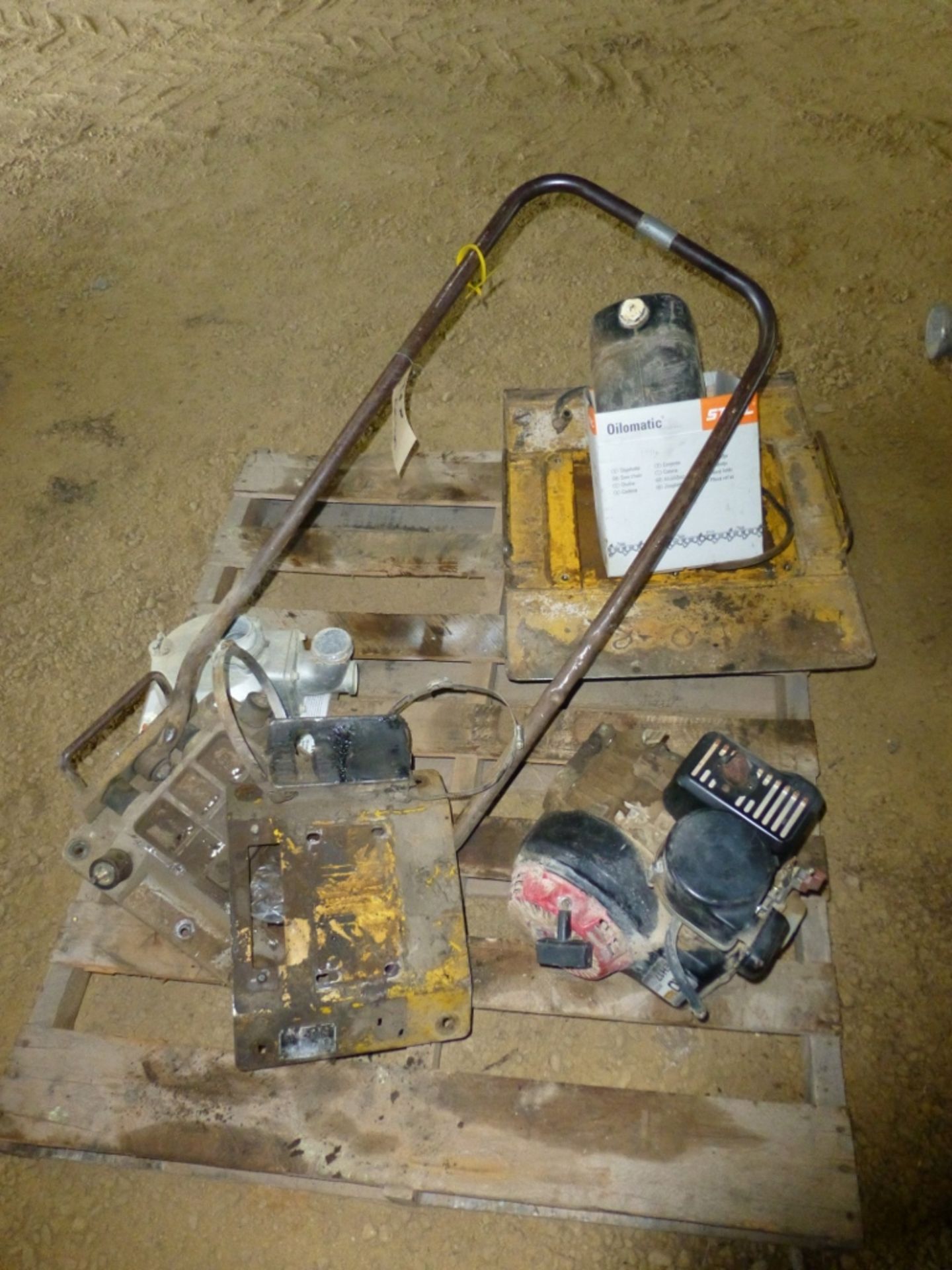 Pallet with plate compactor parts and Honda engine, not seized.