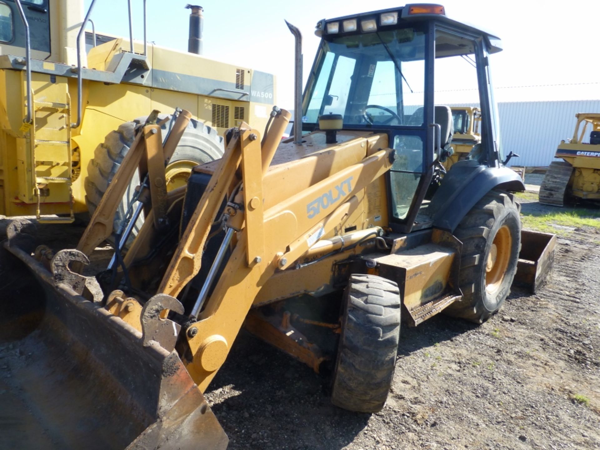 Case 570 LXT loader tractor with box scraper, missing left cab door, 8586 unverified hrs, front - Image 13 of 17