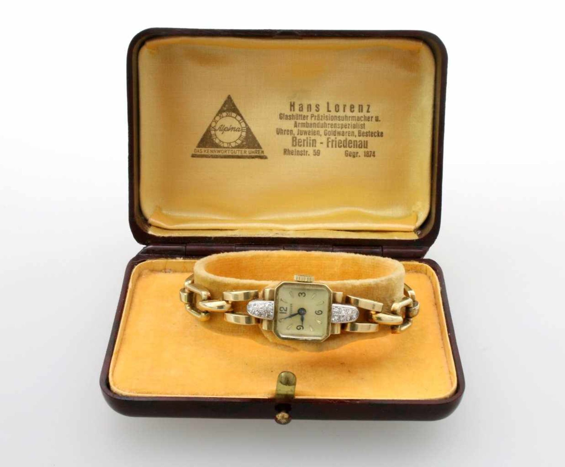 Goldene Armbanduhr Eszeha - brillantbesetzt Handaufzugswerk, rechteckiges Gelbgoldgehäuse 14 x 19
