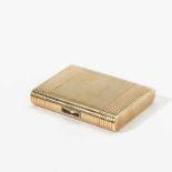 An Art Deco 14 carat gold and sapphire cigarette case Circa 1925 The rectangular case ribbed, the