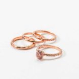 Three 18 carat pink gold rings and an 18 carat pink gold and pink sapphire ring 21st century