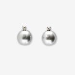 A pair of 18 carat white gold, diamond and South-Sea pearl ear studs 21st century Each designed