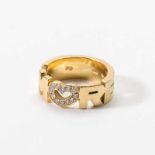 An 18 carat gold and diamond 'amore' band ring Italy, circa 1990 The plain band centered by 'amore'