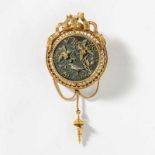 A 14 carat gold and silver Japonaise style brooch/pendant Circa 1880 Circular-shaped, decorated