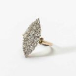 An 18 carat gold and diamond ring England, circa 1890 Lozenge-shaped and set with old-cut diamonds,