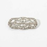 A platinum, 18K white gold and diamond Art Deco plaque brooch Circa 1920 Of open worked floral