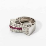 A Retro diamond and ruby ring Circa 1935 Throughout set with old-cut diamonds and centered by a