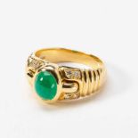 An 18 carat gold, diamond and emerald Bvlgari ringCirca 1980Centered by an oval-shaped cabochon-