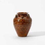 A Chinese or Southeast Asian amber-glazed storage jarMing dynasty (1368-1644)The shoulder applied