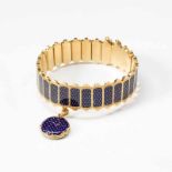 An 18 carat gold and blue enamel bracelet with locket pendant20th centuryThe flexible gold bracelet,