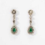 A pair of diamond and emerald ear pendantsEarly 20th centuryEach designed as an old-cut diamond