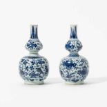 Two small Dutch Delft blue and white vasesOne marked for De Klaauw, 17th-18th century, the other