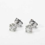 A pair of 18 carat white gold and diamond ear studs21st centuryEach set with a circular-cut