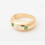 An 18 carat gold, diamond and emerald Cartier band ring20th centuryDesigned as a plain gold band,