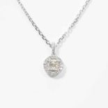 An 18 carat white gold and diamond necklet21st centuryThe cushion-cut diamond within diamond set