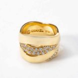 An 18 carat gold and diamond Chanel ring21st centuryDesigned as an entwined motif with circular-